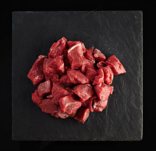 Simmering beef cubes